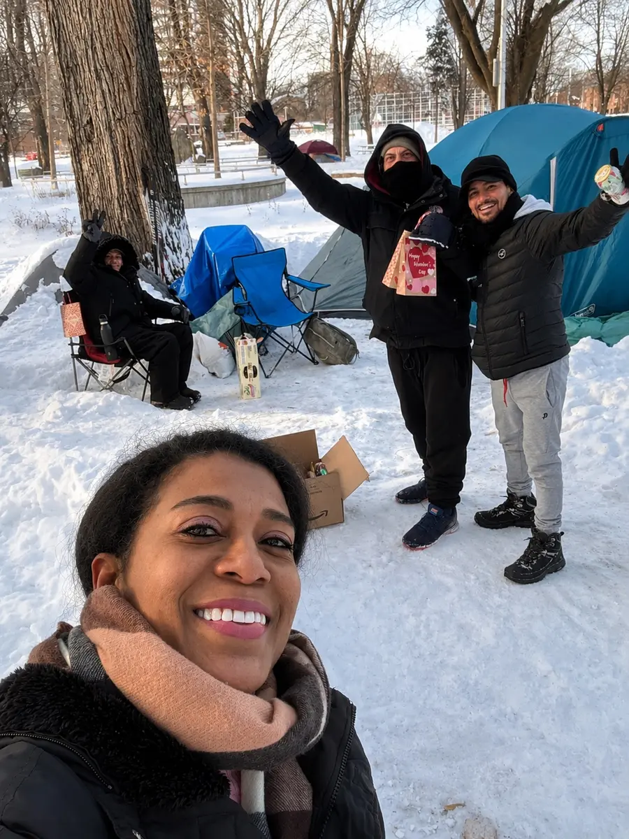 LAC volunteers sharing Valentine's gifts outdoors